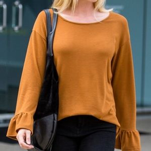 Russet Brown Peplum Ruffle Longsleeved Top
